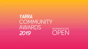 A yellow, pink and white logo for the Yarra Community Awards 2019.